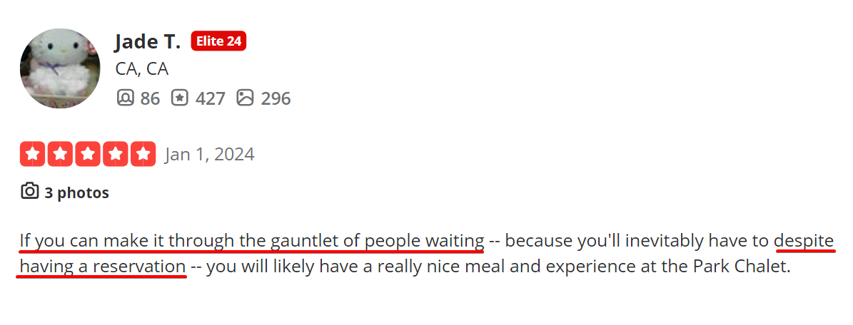 negative review about patrons waiting at the restaurant despite having a reservation